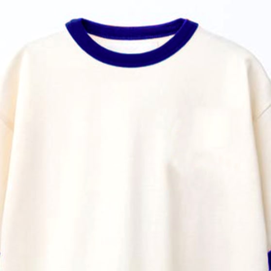 Contrast ringer rib at the neck of a cream cotton jersey T-shirt