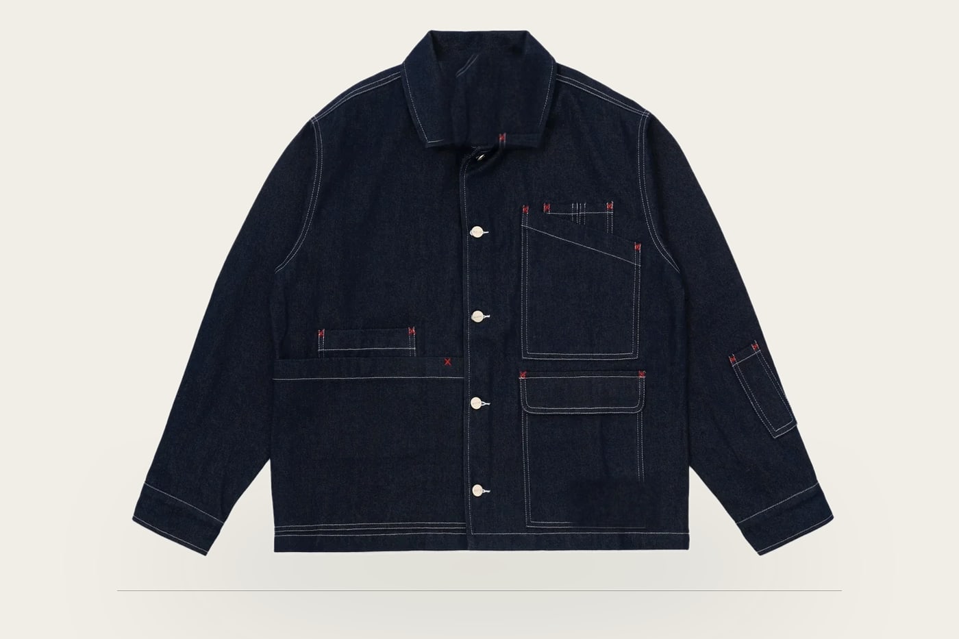 Indigo denim work jacket with red bartacks and contrast topstitching